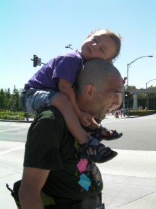 russel could not stay awake on dad's shoulders 
