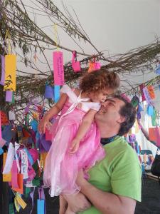 Cydnee (as Aurora) gives dad a kiss after he helped her hang her Hopes and Dreams on the Dream Tree (hers was "I wish every little girl felt like a princesss")